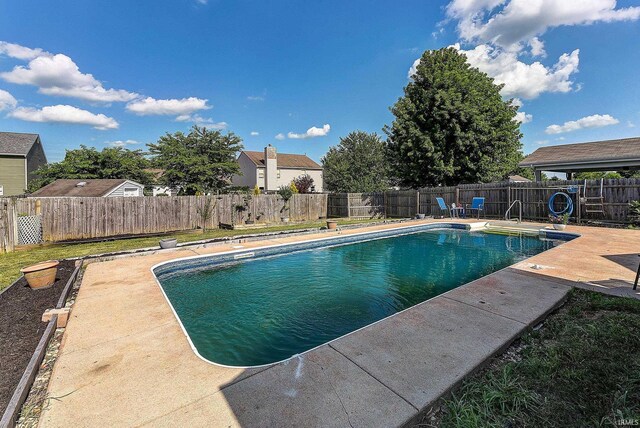 209 N Wilmington Ln, Lafayette, IN 47905 - view of swimming pool with a fenced backyard and a patio area