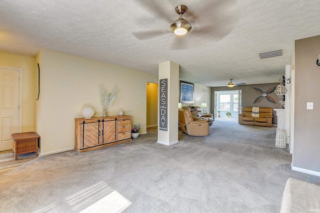 209 N Wilmington Ln, Lafayette, IN 47905 - living area with ceiling fan, carpet flooring, and a textured ceiling