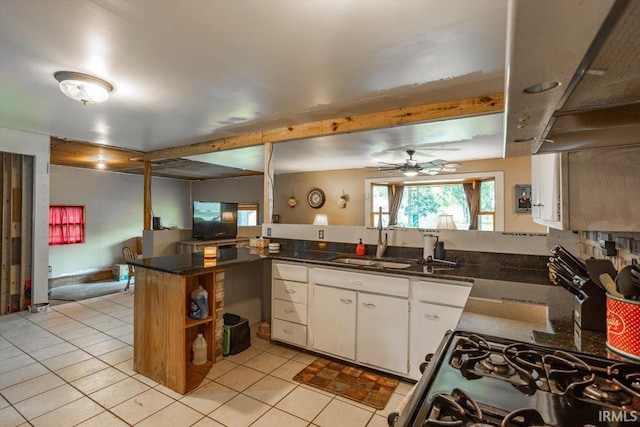6943 Main St, West Point, IN 47992 - kitchen featuring light tile patterned floors, open shelves, black gas range, white cabinetry, and a ceiling fan