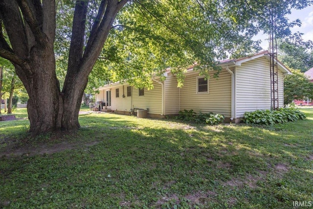 6943 Main St, West Point, IN 47992 - view of side of home with a yard