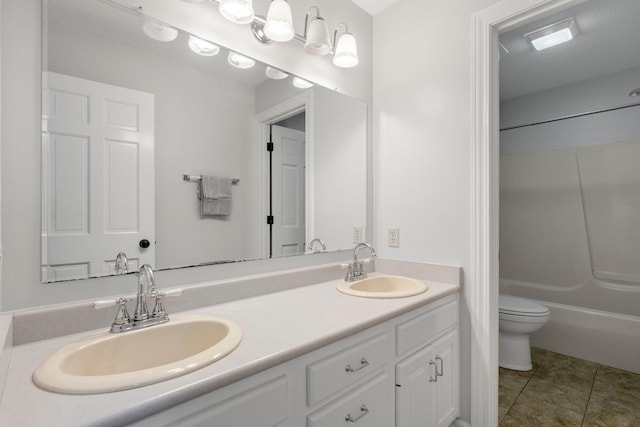 7415 Witling Blvd, Roanoke, IN 46783 - bathroom featuring double vanity, tile patterned floors, and washtub / shower combination