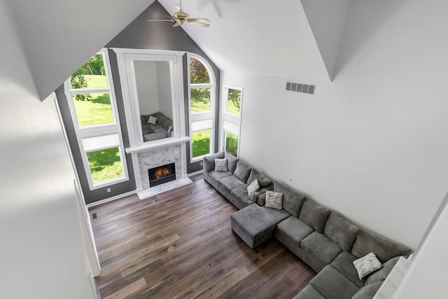 7415 Witling Blvd, Roanoke, IN 46783 - living room featuring ceiling fan, lofted ceiling, dark wood-style floors, and a premium fireplace