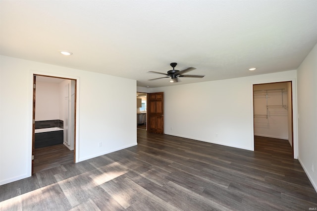 719 N Hathaway St, Winamac, IN 46996 - spare room featuring dark wood-type flooring, a ceiling fan, and recessed lighting