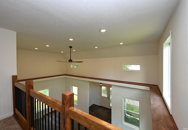 719 N Hathaway St, Winamac, IN 46996 - hallway with an upstairs landing, recessed lighting, and wood finished floors