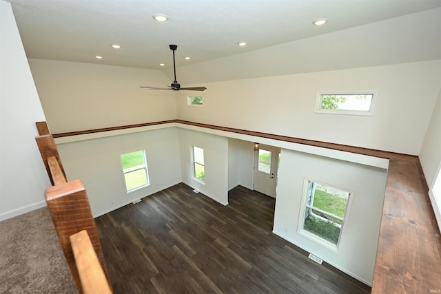 719 N Hathaway St, Winamac, IN 46996 - unfurnished living room with a ceiling fan, plenty of natural light, recessed lighting, dark wood-type flooring, and a high ceiling