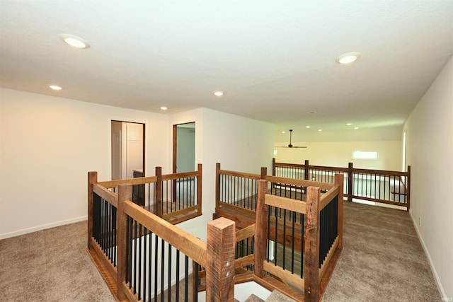 719 N Hathaway St, Winamac, IN 46996 - corridor with an upstairs landing, carpet, and recessed lighting