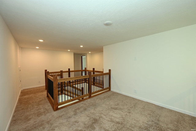 719 N Hathaway St, Winamac, IN 46996 - spare room with carpet floors and recessed lighting