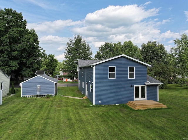 719 N Hathaway St, Winamac, IN 46996 - back of house featuring a lawn