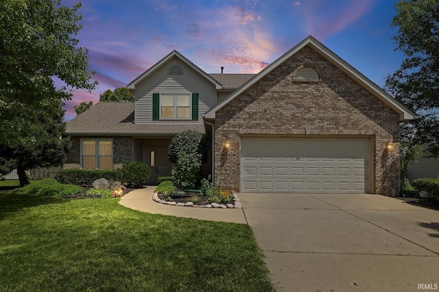1709 Stonegate Cir, Lafayette, IN 47909 - traditional-style home featuring brick siding, driveway, a lawn, and a garage