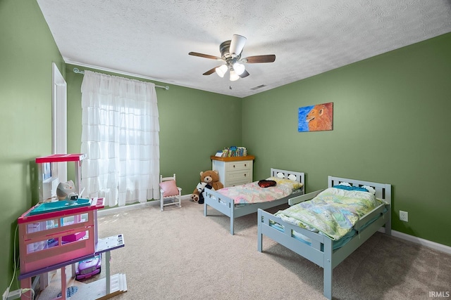 1709 Stonegate Cir, Lafayette, IN 47909 - carpeted bedroom with a textured ceiling and a ceiling fan