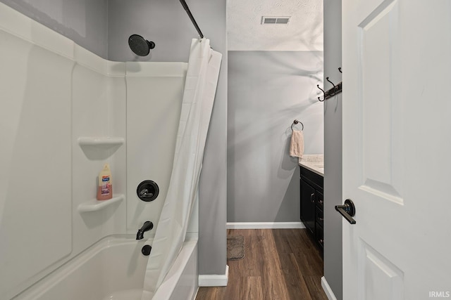 1709 Stonegate Cir, Lafayette, IN 47909 - bathroom with shower / tub combo with curtain, wood finished floors, and vanity