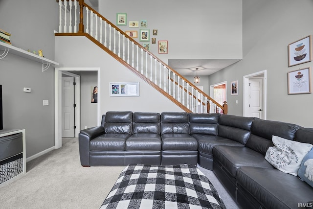 1709 Stonegate Cir, Lafayette, IN 47909 - carpeted living area with stairway and a towering ceiling