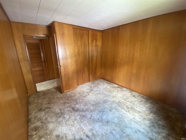 1415 Virginia St, Lafayette, IN 47905 - carpeted spare room with wood walls