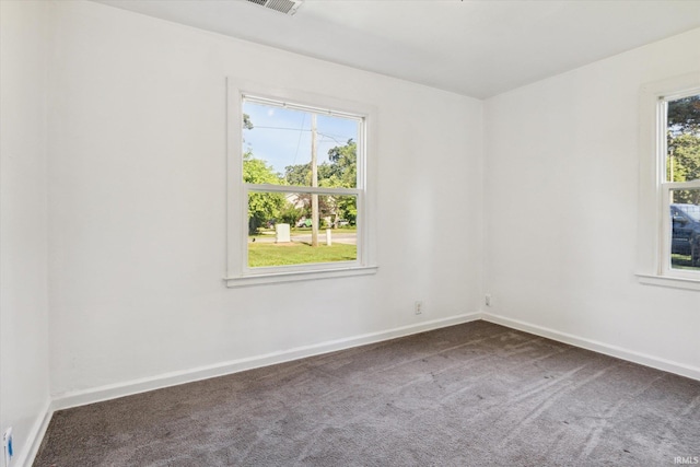 55310 Moss Rd, South Bend, IN 46628 - empty room featuring carpet and baseboards