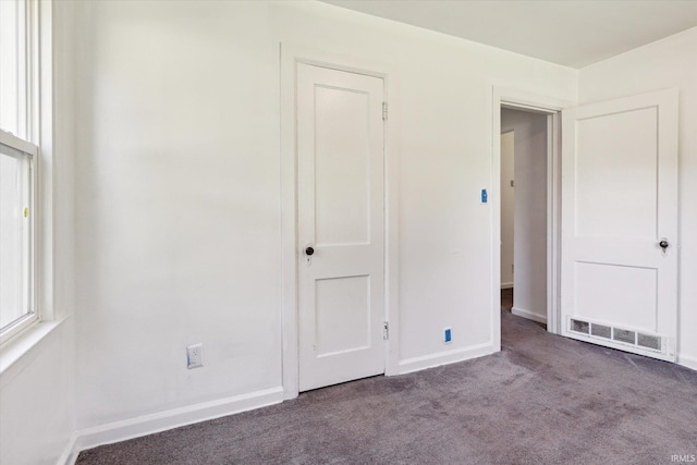 55310 Moss Rd, South Bend, IN 46628 - unfurnished bedroom with carpet flooring and baseboards