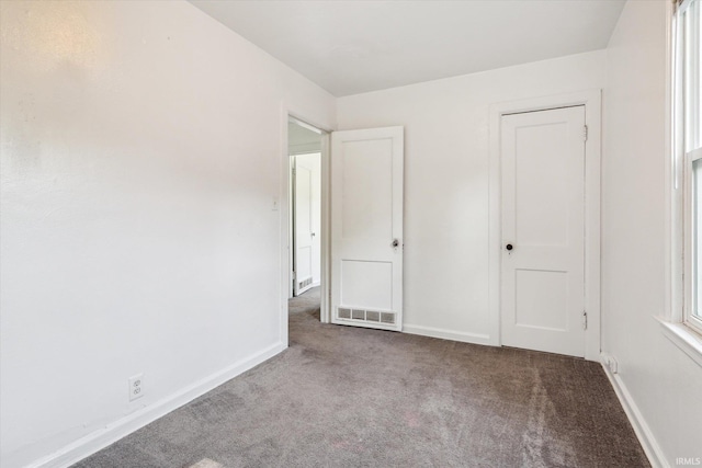 55310 Moss Rd, South Bend, IN 46628 - unfurnished bedroom featuring carpet and baseboards