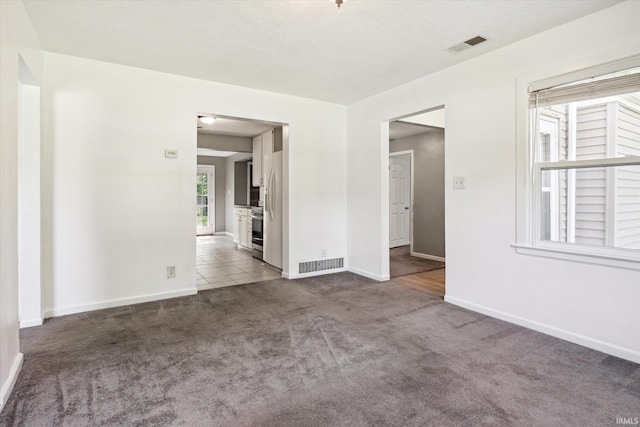 55310 Moss Rd, South Bend, IN 46628 - carpeted empty room featuring baseboards