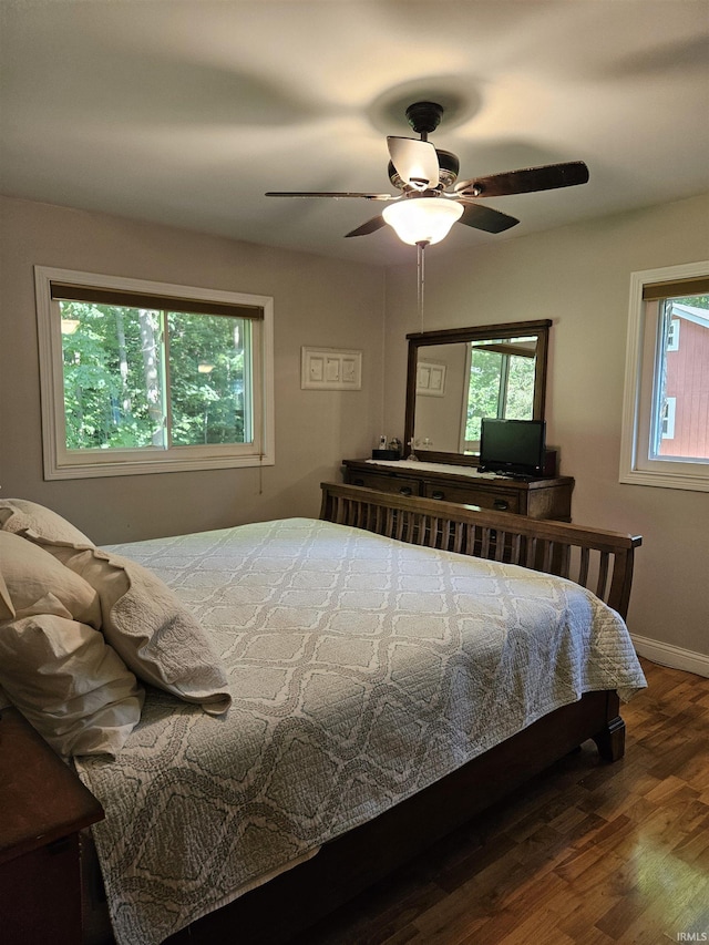 3475 W 1175 N Rd, Decatur, IN 46733 - bedroom featuring wood finished floors, multiple windows, and ceiling fan