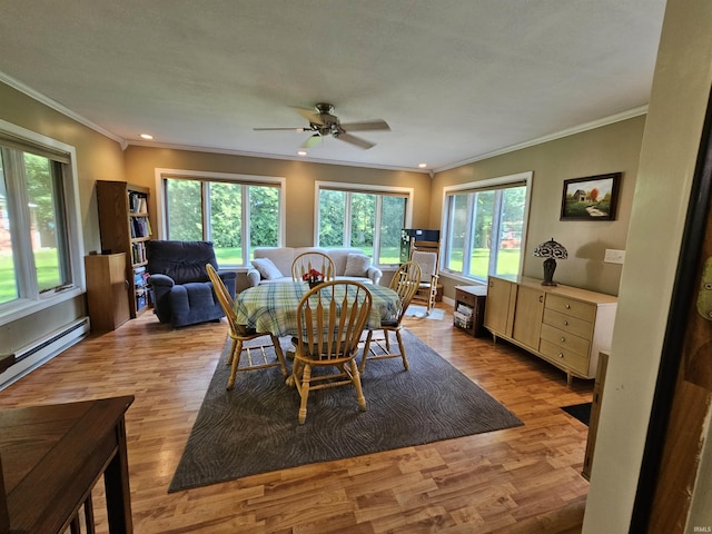3475 W 1175 N Rd, Decatur, IN 46733 - dining area featuring a ceiling fan, crown molding, light wood-style flooring, recessed lighting, and baseboard heating