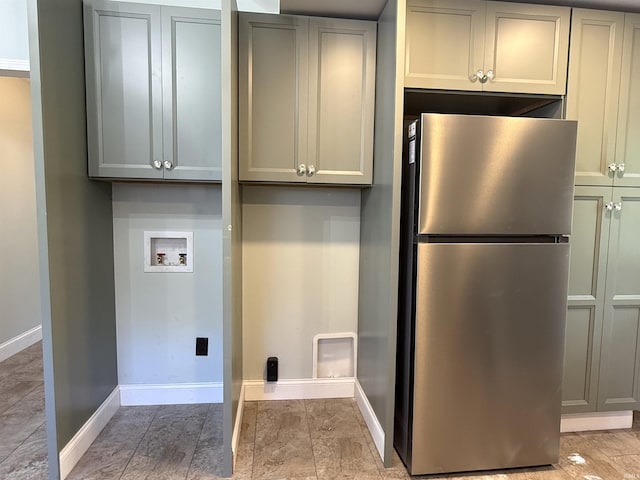 712 N Lindsay St, Kokomo, IN 46901 - laundry area with washer hookup and cabinet space