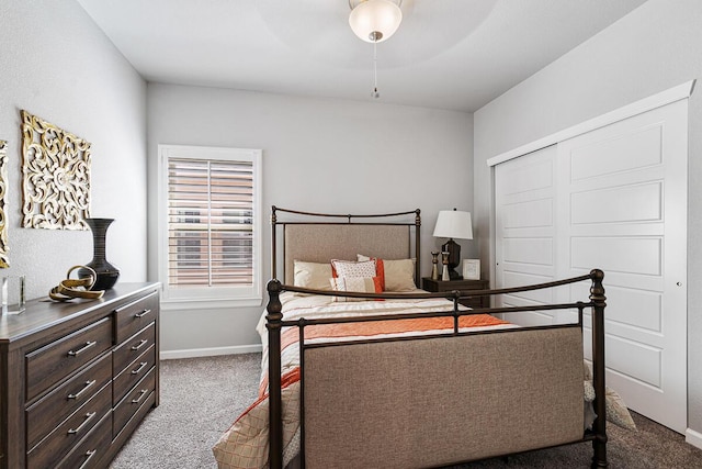 bedroom with carpet flooring, a closet, and ceiling fan