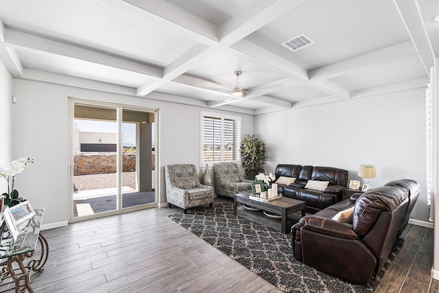 living room featuring beamed ceiling, hardwood / wood-style flooring, ceiling fan, and coffered ceiling