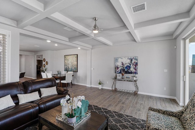 living room featuring hardwood / wood-style floors, ceiling fan, coffered ceiling, and beam ceiling