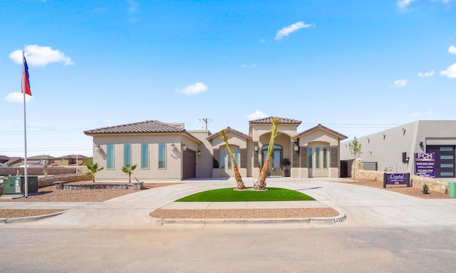 2425 Cesar Cordova Pl, El Paso, TX 79938 - mediterranean / spanish-style house with central AC unit