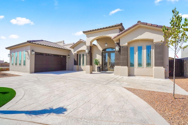 2425 Cesar Cordova Pl, El Paso, TX 79938 - mediterranean / spanish-style house with a garage