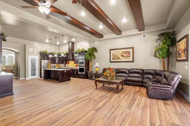 2425 Cesar Cordova Pl, El Paso, TX 79938 - living room with ceiling fan, light wood-type flooring, and beamed ceiling