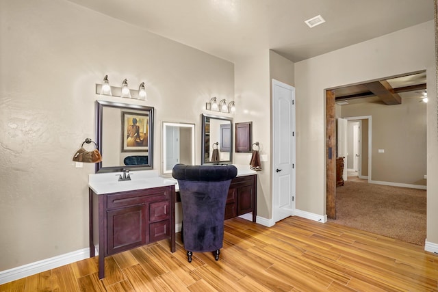 2425 Cesar Cordova Pl, El Paso, TX 79938 - bathroom with ceiling fan, vanity, and hardwood / wood-style floors