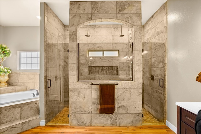 2425 Cesar Cordova Pl, El Paso, TX 79938 - bathroom with independent shower and bath, hardwood / wood-style floors, and vanity
