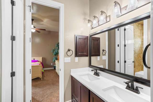 2425 Cesar Cordova Pl, El Paso, TX 79938 - bathroom featuring ceiling fan and double vanity