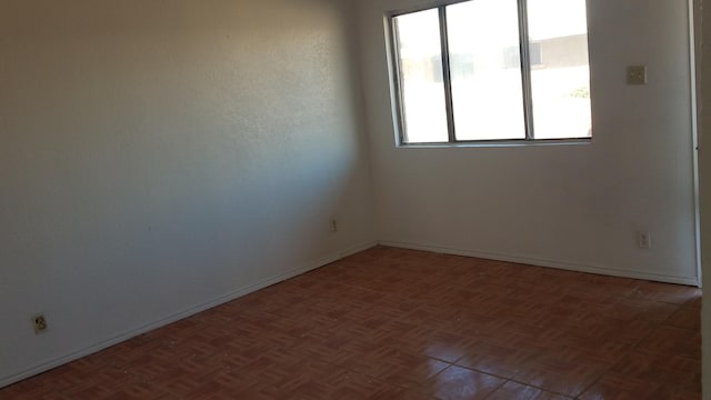 empty room with parquet floors