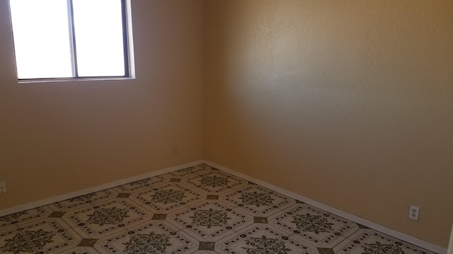 view of tiled empty room