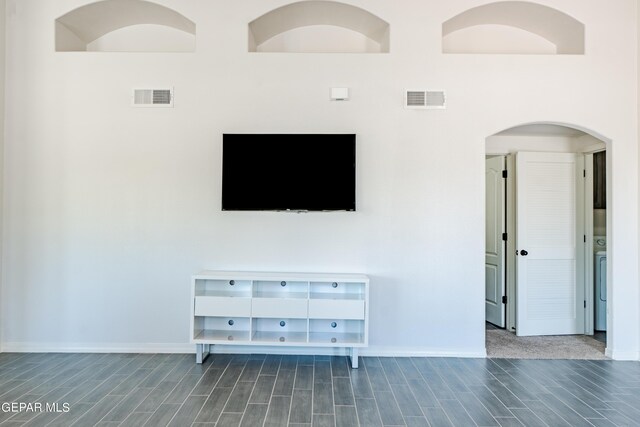 living room with dark hardwood / wood-style floors