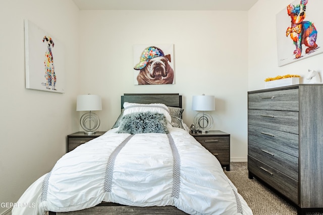 carpeted bedroom with baseboards