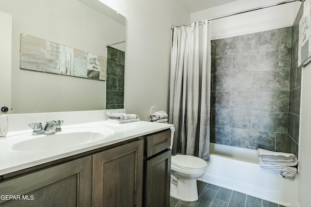 full bathroom with toilet, vanity, and shower / bathtub combination with curtain