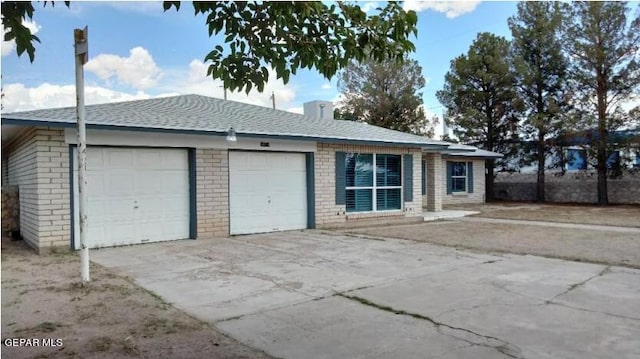 ranch-style home with a garage