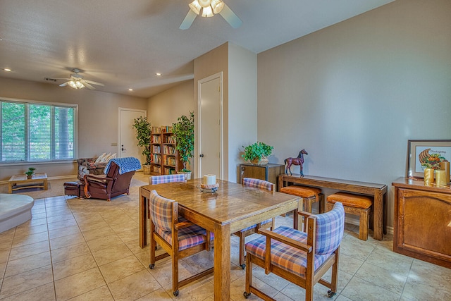 dining room with light tile flooring and ceiling fan