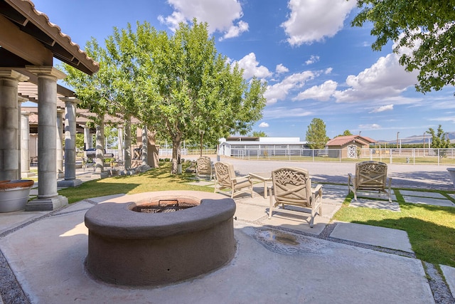 view of patio featuring a fire pit