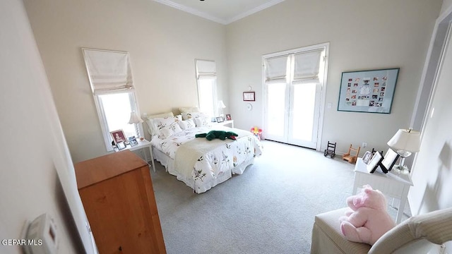 carpeted bedroom featuring ornamental molding