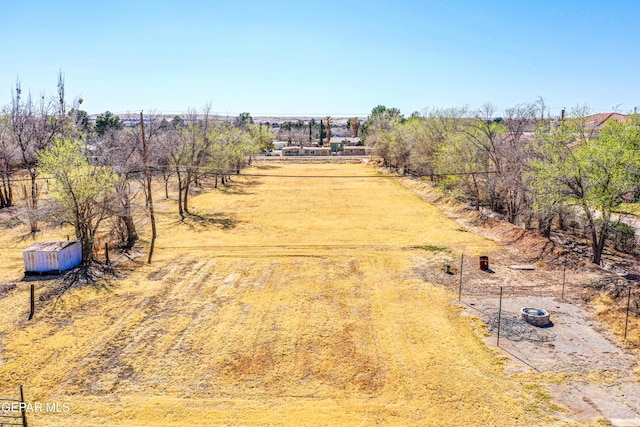 birds eye view of property featuring a rural view