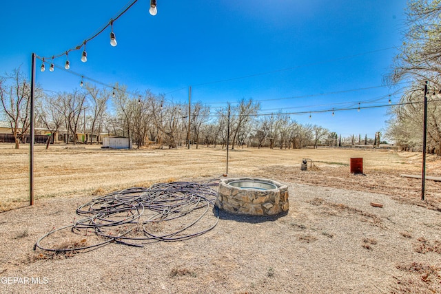 view of yard with a rural view