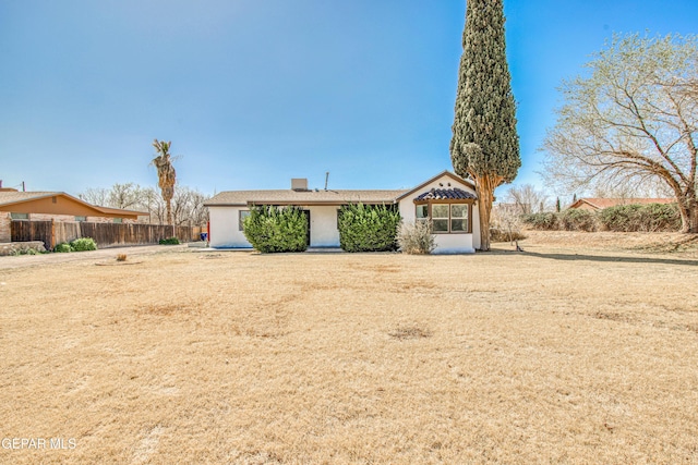 view of front of property with fence