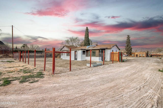 exterior space with a fenced front yard