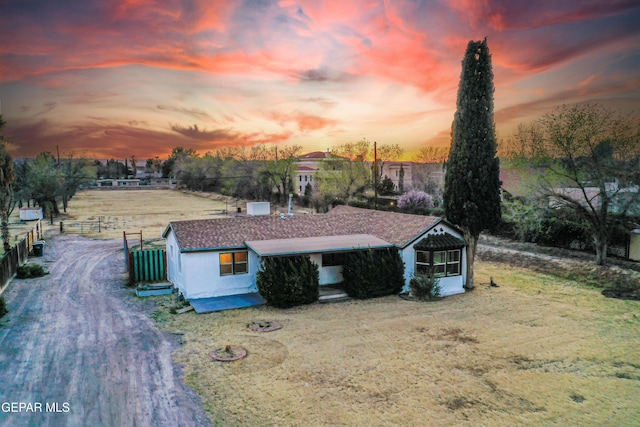 view of front of house with fence