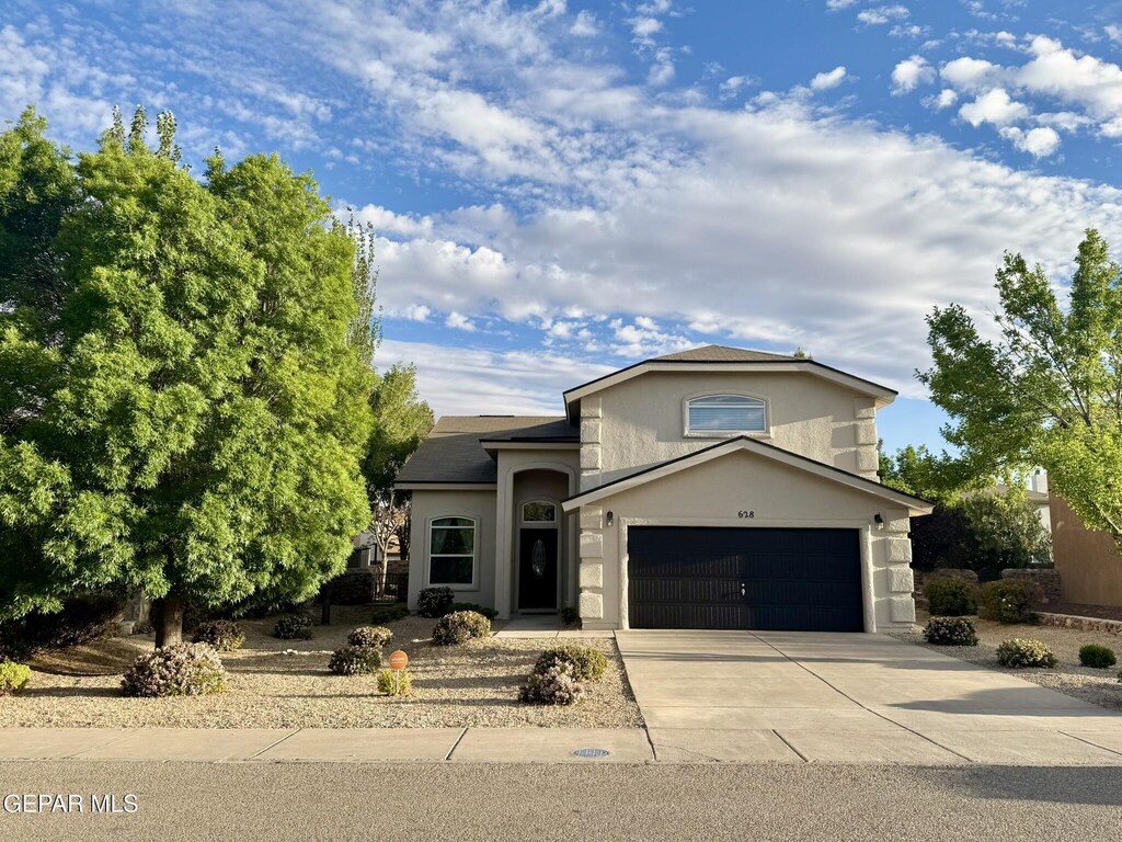628 Vern Butler Dr, El Paso, TX 79932 - view of front of home featuring stucco siding and concrete driveway