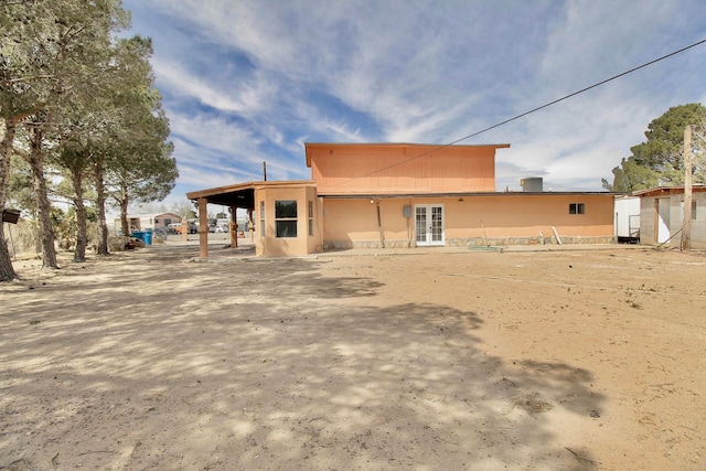 rear view of house featuring a patio