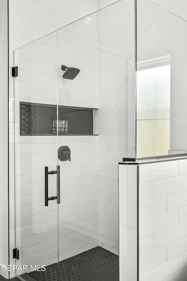 full bath featuring a stall shower